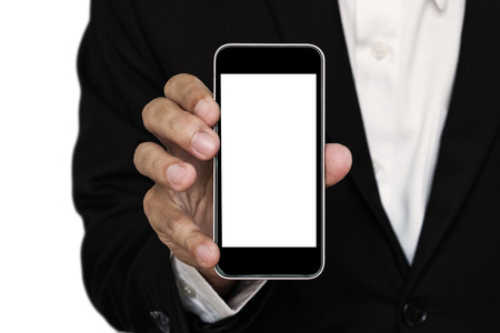 Businessman showing mobile phone, with copy spaceの写真素材