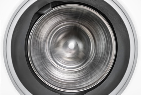 Spin motion of internal view of a washing machine drum during wash