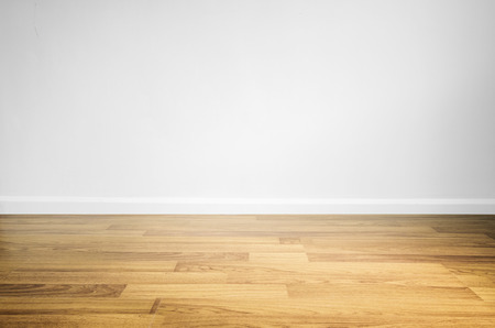 Laminated wood floor with white wallの写真素材