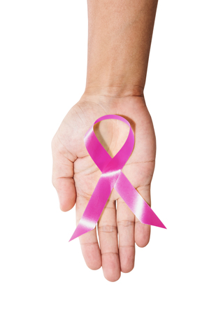 Aids Awareness. male hand holding pink AIDS awareness ribbon, isolated on white backgroundの写真素材