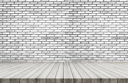 White wood floor, with white brick wall texture backgroundの写真素材