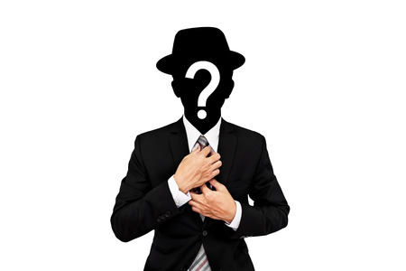 Businessman with question mark on head, isolated on white background, secret agentの写真素材