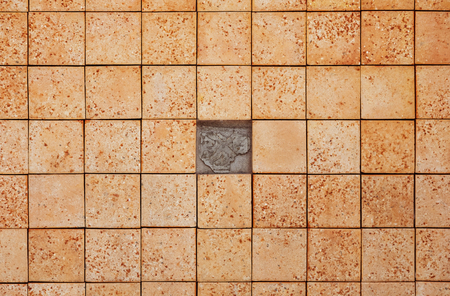 Square bricks texture with missing pieceの写真素材