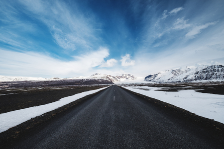 Country road landscaped in winterの写真素材