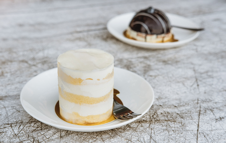 Dessert, coconut whip creme with white chocolate cake, selective focusの写真素材