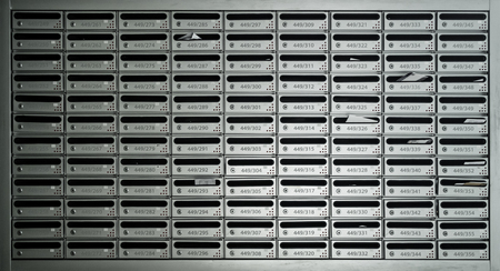 Many posting mail boxes with room numberの写真素材