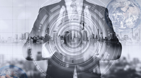 Businessman with city hologram and futuristic technology. futuristic creator business technology,  Elements of this image furnished by NASAの写真素材