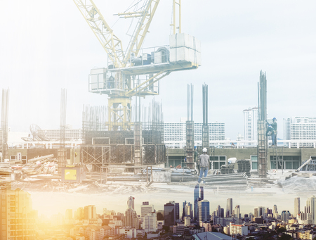 Double exposure, Bangkok city in sunset, with real estate site construction with workersの写真素材