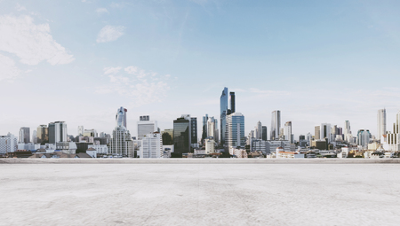 Panoramic city view with empty concrete floorの写真素材