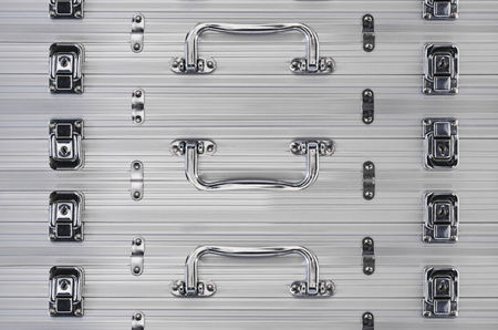 Steel luggage lock and handle backgroundの写真素材