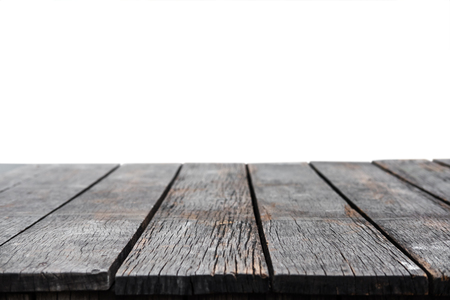 Empty wood table top, isolated on white backgrounds with copy spaceの写真素材