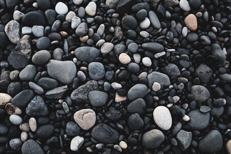 Black pebble stonesの写真素材