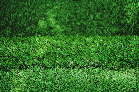 Green turf grass texture with white line, in soccer fieldの写真素材