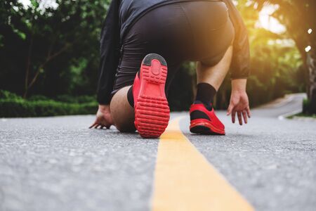 Runner's feet running on the road in public parks, run for losing weightの写真素材