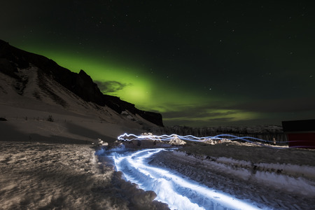 Aurora Borealis in with light effects, in winterの写真素材
