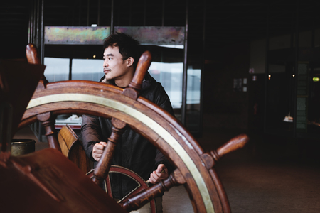 a man controlling wooden helmの写真素材