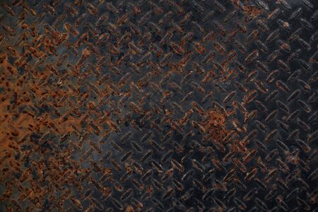 Old rusty black metal plate pattern textureの写真素材