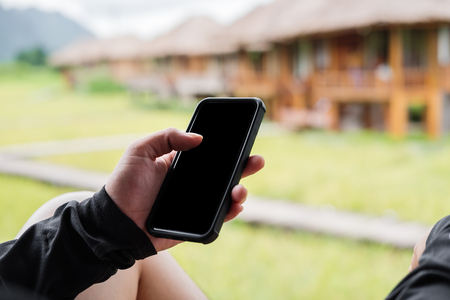 a man using mobile smart phoneの写真素材