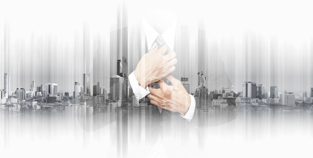 Double exposure businessman with panoramic Bangkok cityspace backgroundの写真素材