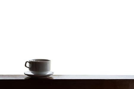 Cup of hot drinks with steam on wood table, isolated on white background, hot coffee, tea, chocolate and etc.の写真素材