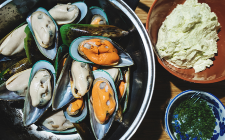 Fresh mussel shellfish, preparation seafood ingredients for Mussel with butter and garlic meal. Top viewの写真素材