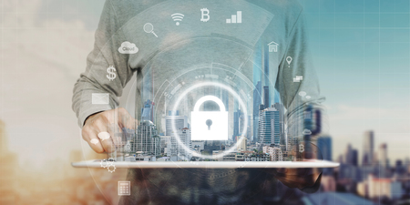 Network connection security system. Businessman using digital tablet and security lock technology iconの写真素材