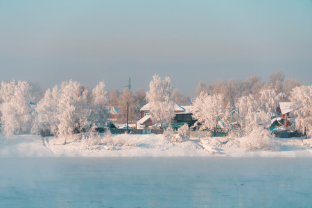 Winter landscape of small town in countryside area of Siberia, Russiaの写真素材