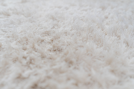 Luxury white wool carpet texture background, selective soft focus for backgroundの写真素材