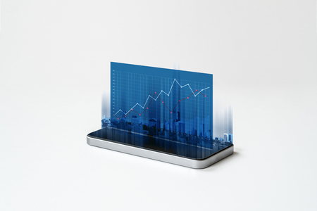 Mobile smart phone and business raising graph hologram screenの写真素材
