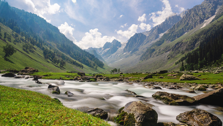 Scenic long exposure water flowing in river with mountain landscape in Sonamarg, Jammu and Kashmir, Indiaの写真素材