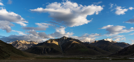 Panoramic mountain landscapes with blue sky and white clouds at Zanskar valley in northern Indiaの写真素材