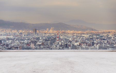Osaka city skyline, downtown business district in sunset with empty concrete floorの写真素材