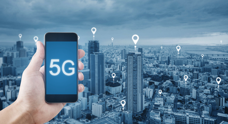 5G technology and internet network connection. Hand holding mobile smart phone using 5g technologyの写真素材