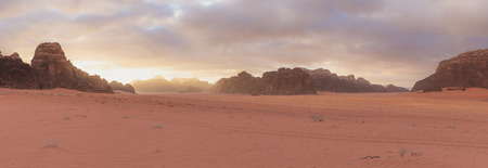 Panoramic desert landscape, Wadi Rum desert in Jordan at sunriseの写真素材
