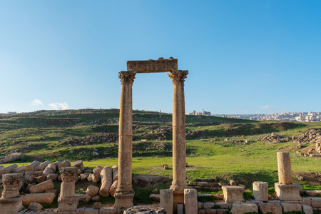 Ancient ruined architecture with meadow in Jerash, Amman, Jordanの写真素材