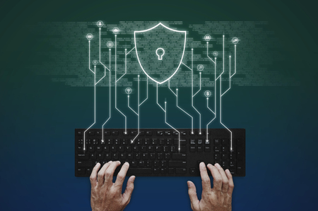 Internet, online network, social networking and online application security system. Hand typing on...