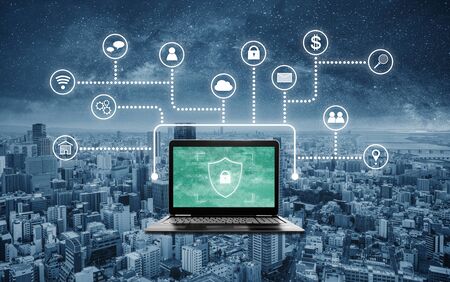 Internet and online network security system. Laptop computer with lock shielding protection icon on...