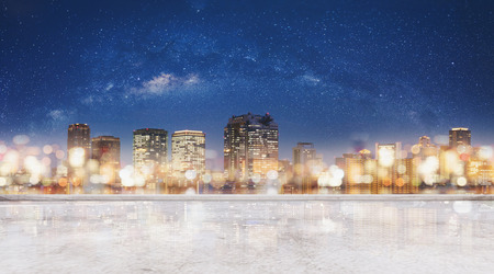 Panoramic Osaka city at night with glowing Bokeh light with starry sky and concrete floorのeditorial素材