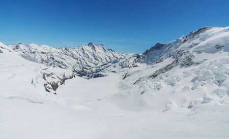 Panoramic winter mountain in Swiss alps mountain range, Switzerlandの写真素材