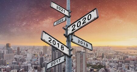 New year concepts on directional road signの写真素材