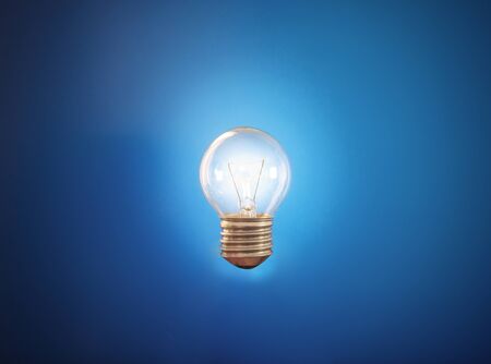 Glowing light bulb, on blue backgrounds