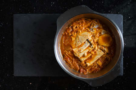 Asian food, Kimchi Jjigae soup. Top view with copy spaceの写真素材