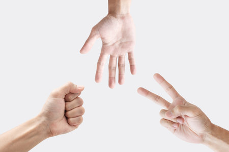 Rock, Scissor and paper hand sign, isolated on white backgroundの写真素材