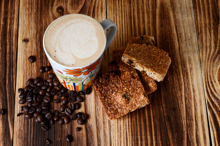 A cup of coffee and homemade cookiesの写真素材
