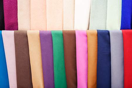 Colorful strips of fabric hang in the store. colored bright Strips of fabric hang in the store. Sale of textilesの写真素材