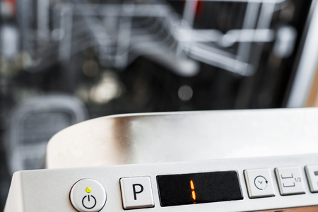 The control panel of the dishwasher. Select the program for dishwashing. Close-upの写真素材