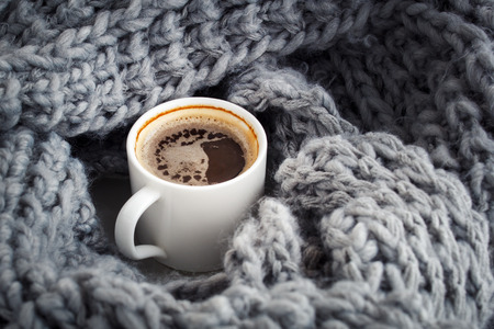 a cup of aromatic coffee wrapped in wool sirloin snodの写真素材