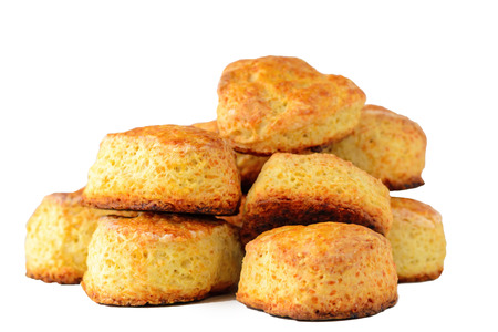 pile of homemade English cheese buns scones on white background isolate