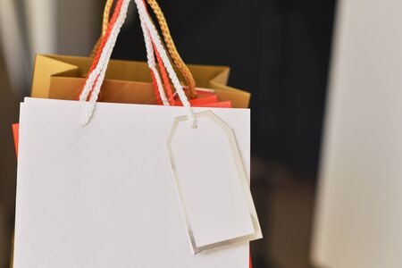 Cllose up of colorful paper shopping bagの写真素材