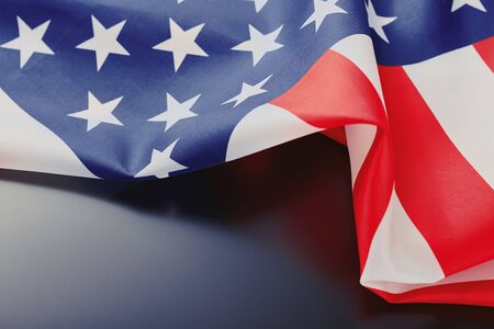 Close up of waving national usa american flag on dark background with copy space. Independence Day...